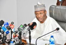 INEC chairman, Prof. Yakubu hale and hearty