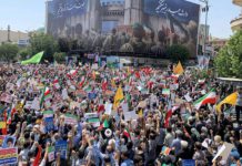 Iranians hold solidarity match for their leaders